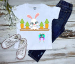 Bunny in carrot patch clipart