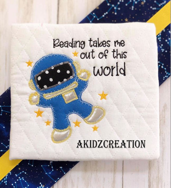 reading takes me out of this world, pocket pillow, reading pillow, astronaut embroidery, astronaut applique, astronaut embroidery design