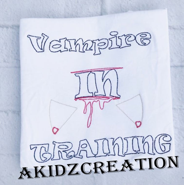 vampire in training embroidery design, vampire embroidery, vampire teeth embroidery design